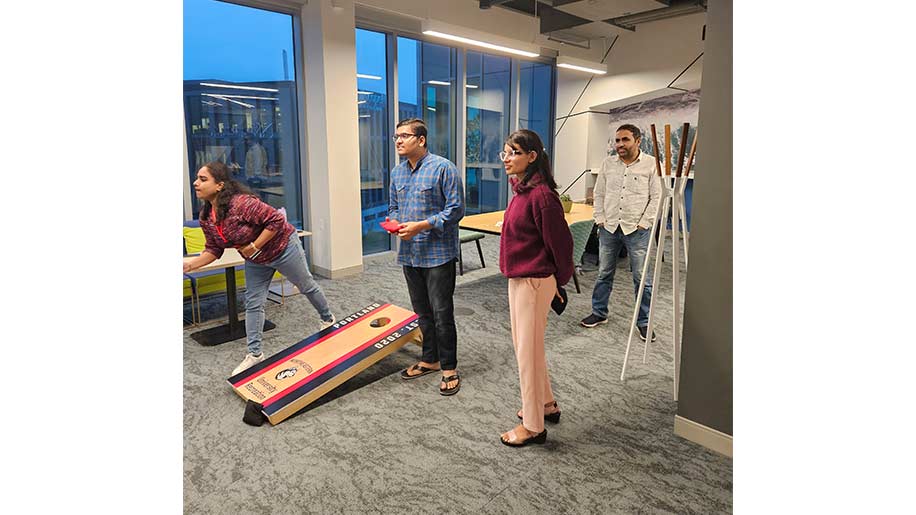 Students playing cornhole at a First Friday event on campus.